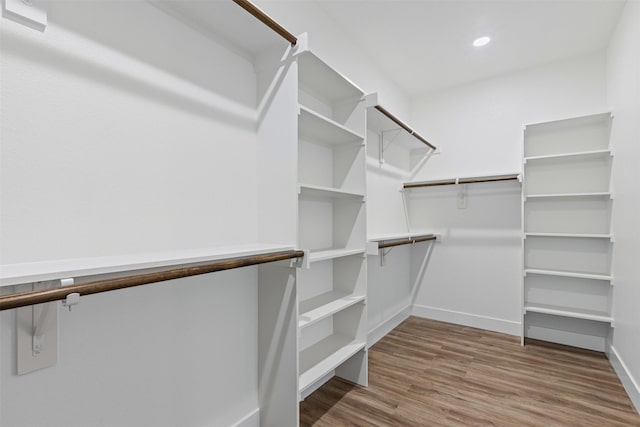 5065 Willie St, Fort Worth, TX 76105 - walk in closet with wood finished floors