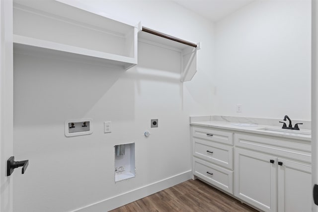 5065 Willie St, Fort Worth, TX 76105 - laundry area with hookup for an electric dryer, hookup for a gas dryer, a sink, dark wood-style floors, and washer hookup