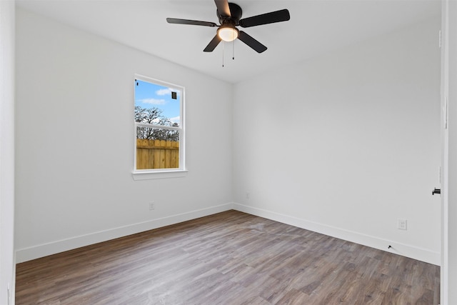 5065 Willie St, Fort Worth, TX 76105 - unfurnished room featuring wood finished floors, baseboards, and a ceiling fan