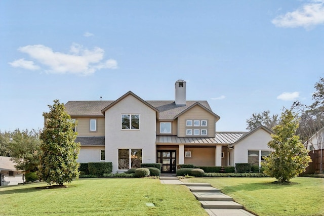 view of front of house with a front lawn