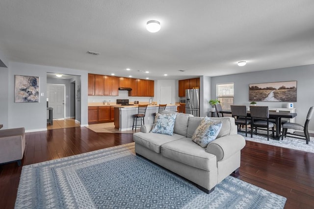 living room with hardwood / wood-style floors