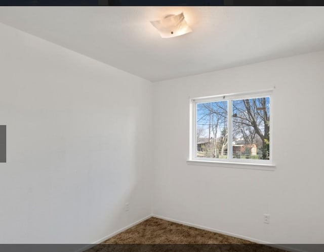 spare room with carpet flooring