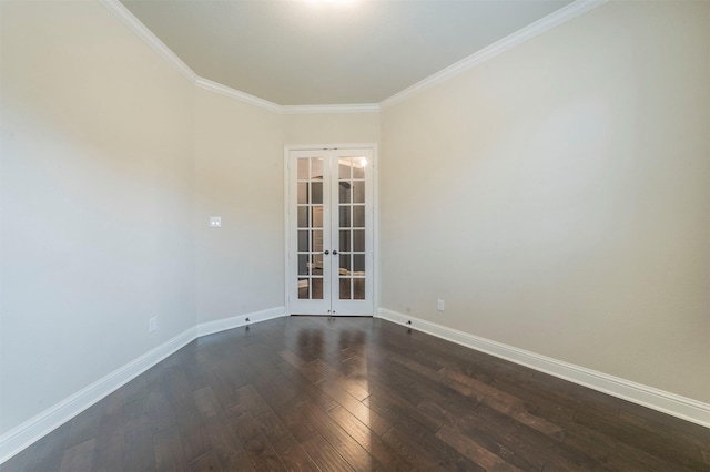 unfurnished room with crown molding, dark wood-type flooring, and french doors