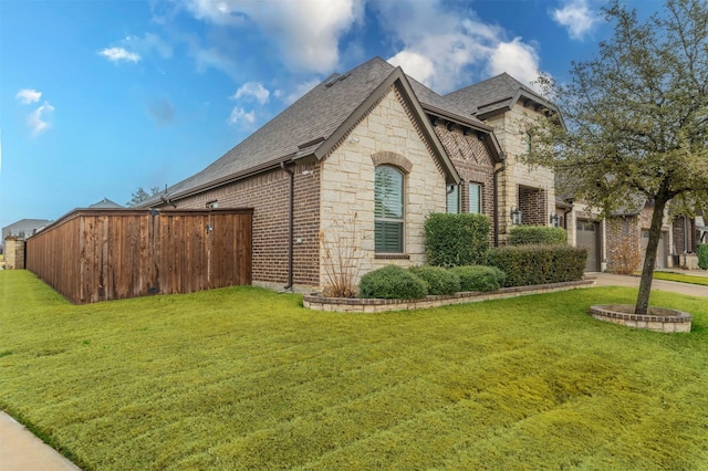 view of home's exterior featuring a yard