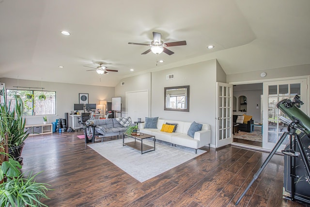 living room with vaulted ceiling, dark wood-type flooring, ceiling fan, and french doors