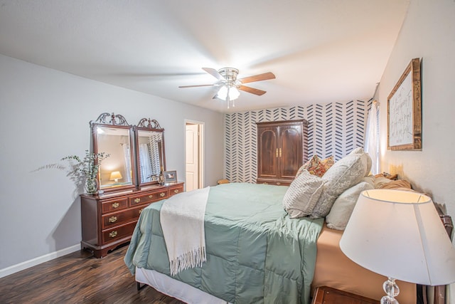 bedroom with dark wood-type flooring and ceiling fan