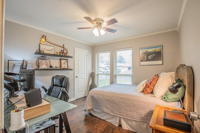 bedroom with ornamental molding, dark wood-type flooring, and ceiling fan