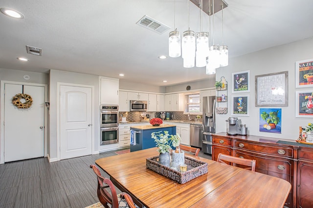 dining area featuring sink