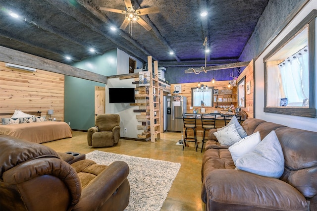 living room featuring wood walls