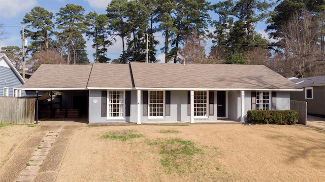 single story home with a carport