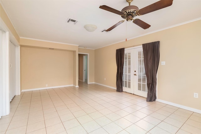 tiled spare room featuring ornamental molding, ceiling fan, and french doors