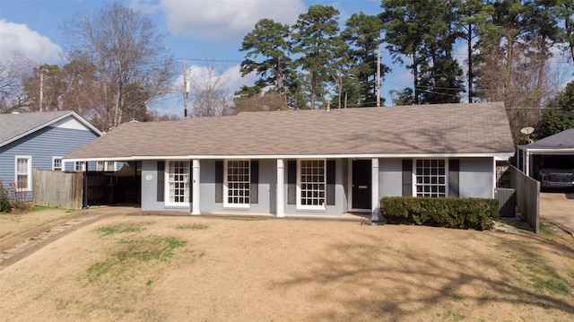 ranch-style house with a front lawn