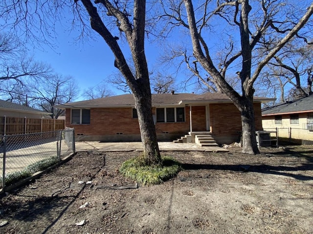 back of house featuring central AC unit