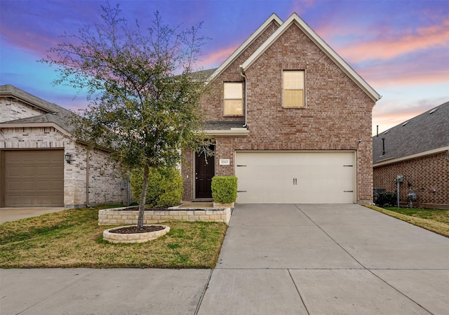 front of property featuring a garage