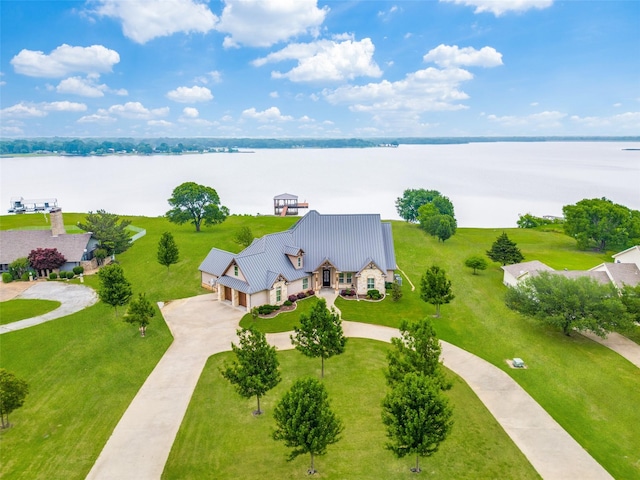 bird's eye view with a water view