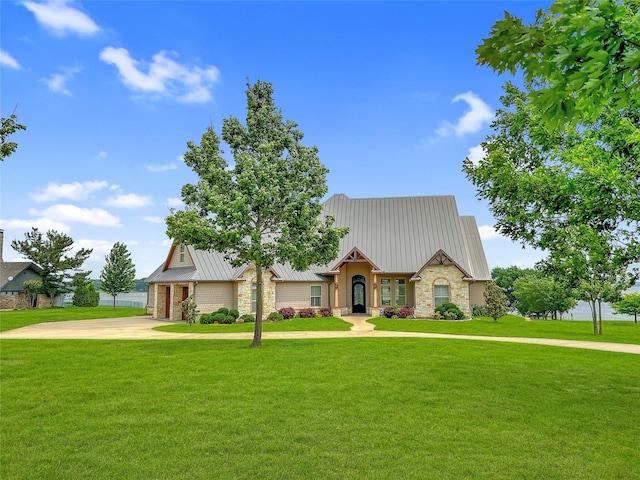 view of front of home with a front yard