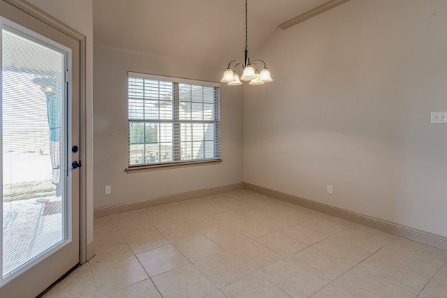 tiled spare room featuring an inviting chandelier and vaulted ceiling