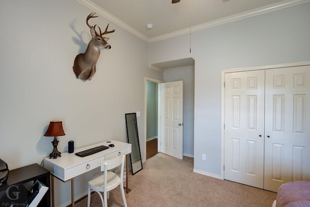 carpeted home office with crown molding