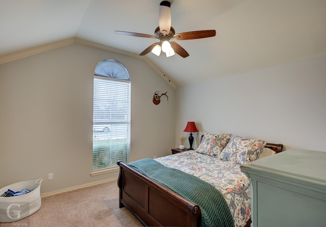 carpeted bedroom featuring lofted ceiling and ceiling fan