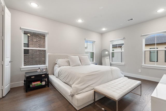 bedroom featuring dark wood-type flooring