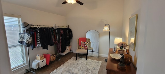 spacious closet with ceiling fan and lofted ceiling