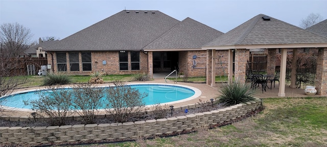 view of pool featuring a patio