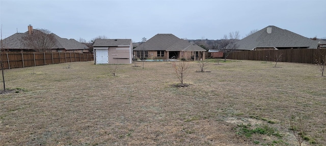 view of yard featuring a storage shed