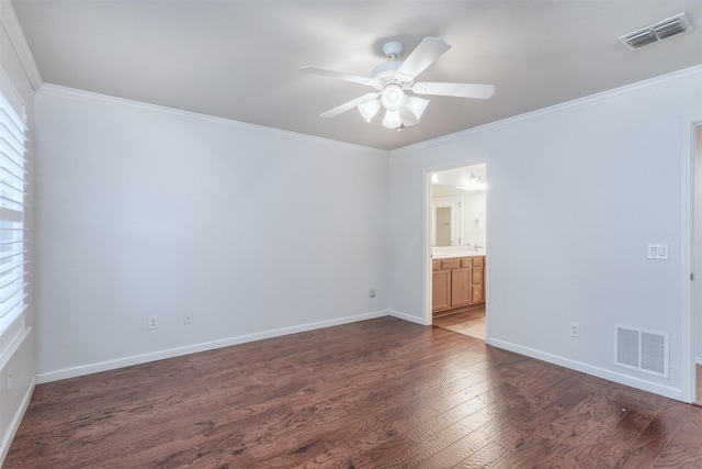 unfurnished room featuring ceiling fan, ornamental molding, and dark hardwood / wood-style flooring