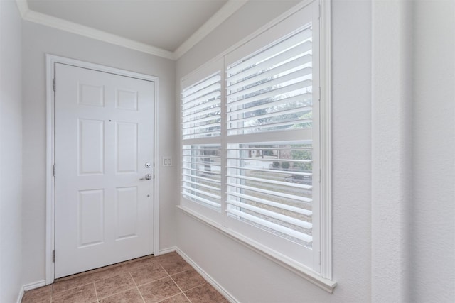 doorway with light tile patterned flooring and ornamental molding