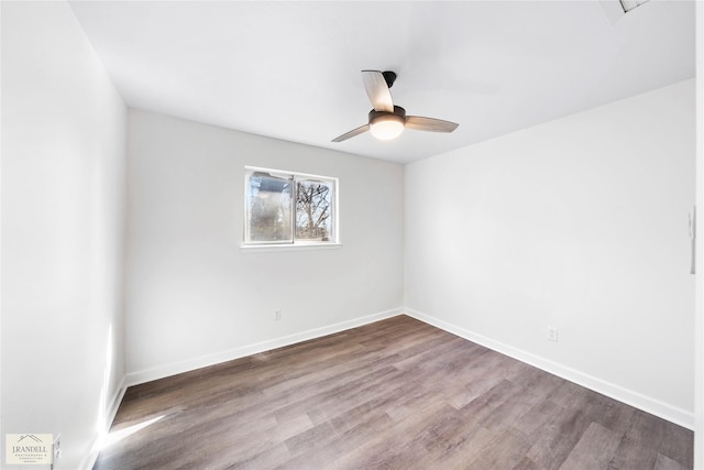 unfurnished room featuring hardwood / wood-style flooring and ceiling fan