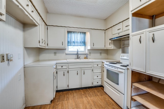 kitchen featuring white cabinetry, sink, light hardwood / wood-style floors, and white range with electric cooktop