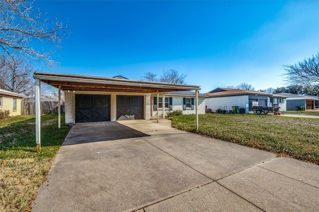 single story home featuring a carport and a front yard