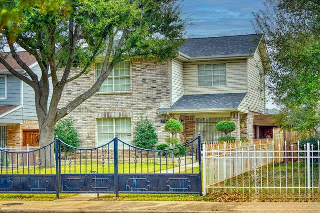 view of front facade featuring a front yard