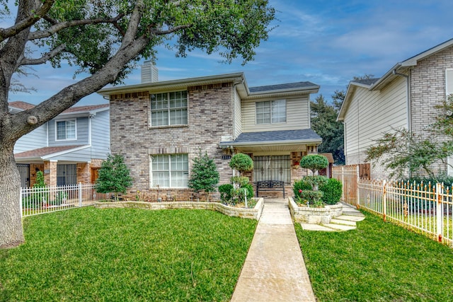 view of front of home featuring a front lawn