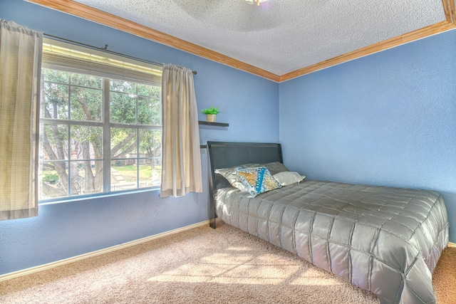 bedroom featuring multiple windows, carpet floors, ornamental molding, and a textured ceiling