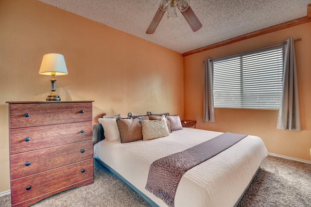 carpeted bedroom featuring ceiling fan, vaulted ceiling, ornamental molding, and a textured ceiling