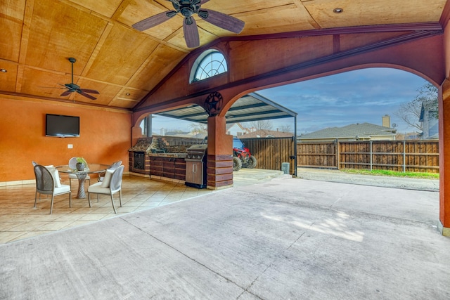 view of patio / terrace with ceiling fan and area for grilling