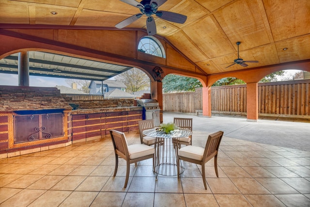 view of patio featuring grilling area and ceiling fan