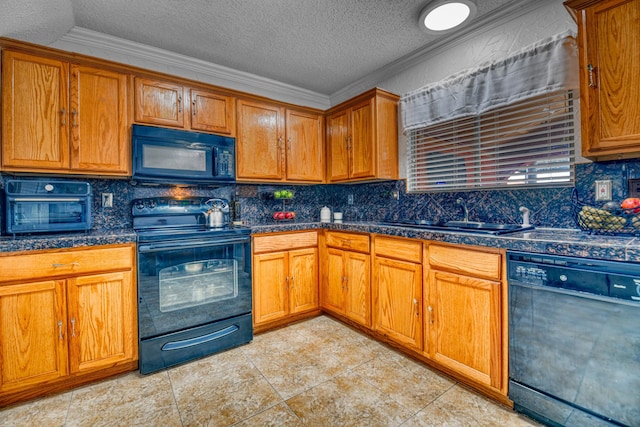 kitchen featuring sink, crown molding, tasteful backsplash, black appliances, and a textured ceiling