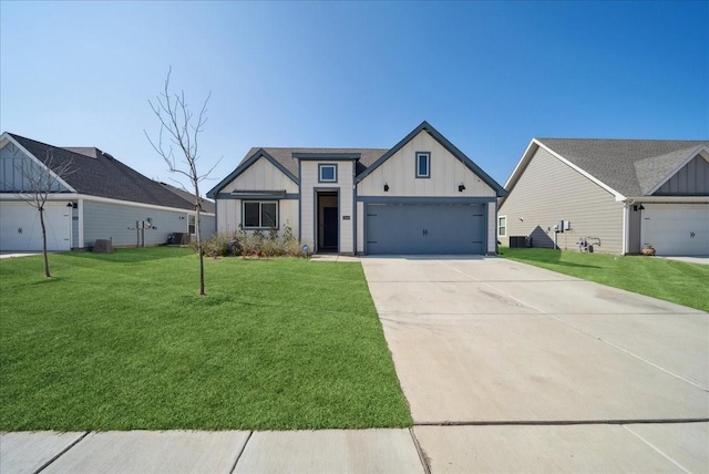 modern inspired farmhouse featuring board and batten siding, an attached garage, driveway, and a front lawn