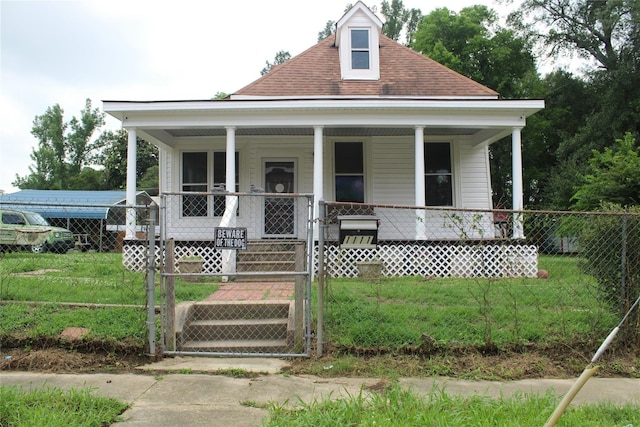 view of front of house featuring a porch and a front lawn