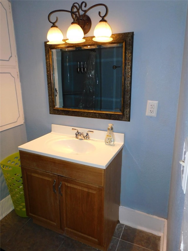 bathroom with vanity and tile patterned flooring