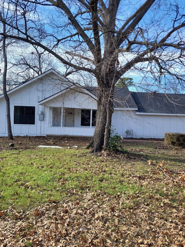 view of home's exterior featuring a yard