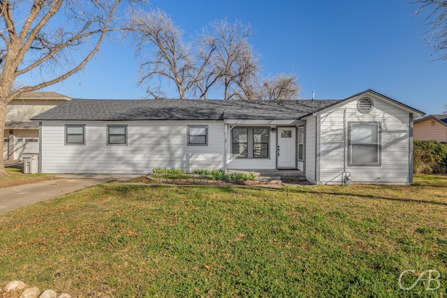 single story home with a front yard