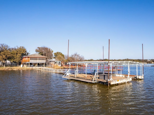 dock area with a water view