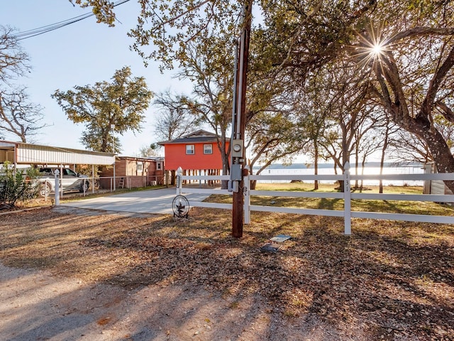 view of yard featuring a carport