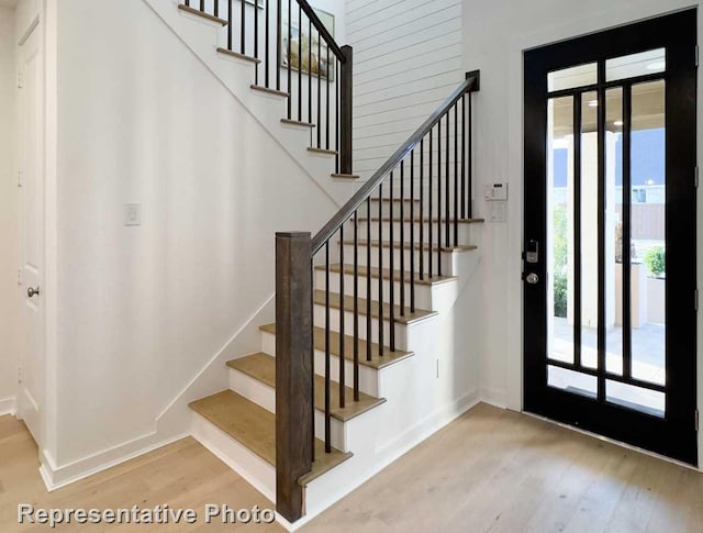 1250 Falls Rush Way, Royse City, TX 75189 - entrance foyer with a healthy amount of sunlight and hardwood / wood-style floors