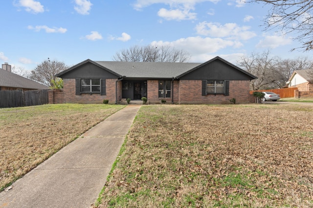 ranch-style house featuring a front lawn