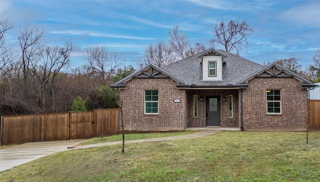 view of front of home with a front yard