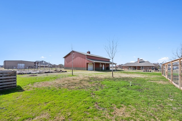 view of yard with an outdoor structure